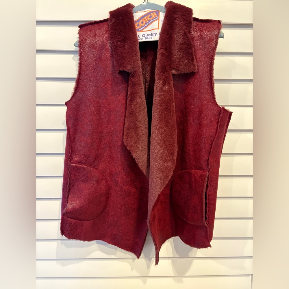 Fortuity red faux leather vest.